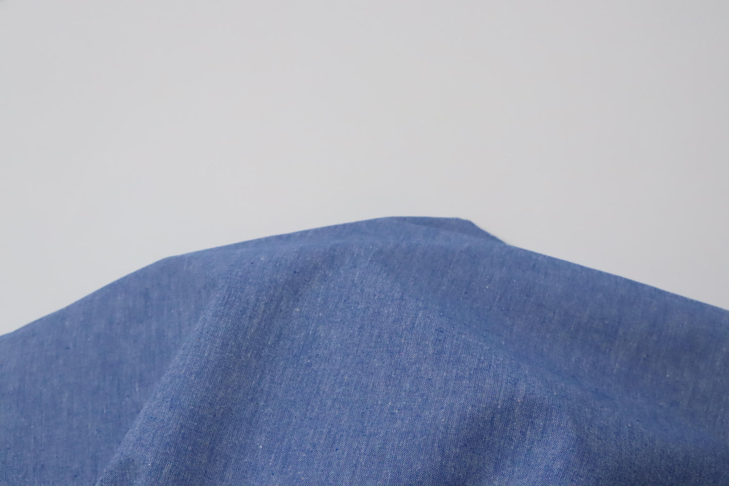 Blue heather chambray style cotton fabric
