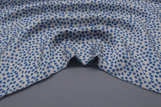 Tissu satin de viscose fond blanc imprimé pois bleus