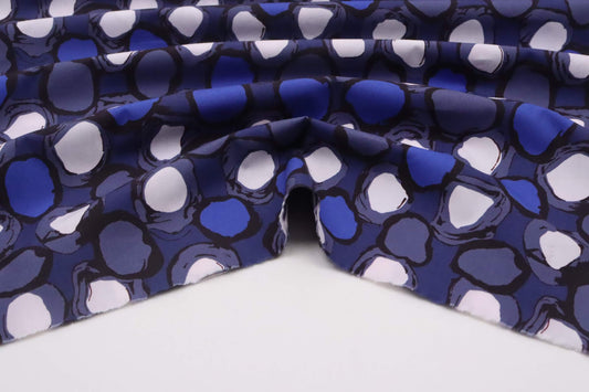 Tissu popeline de coton imprimé graphique ronds bleu