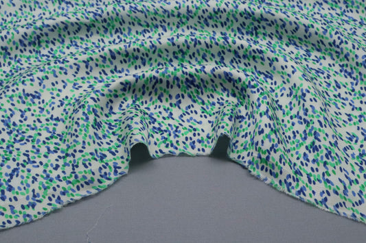 Tissu satin de viscose blanc imprimé pois bleus et verts