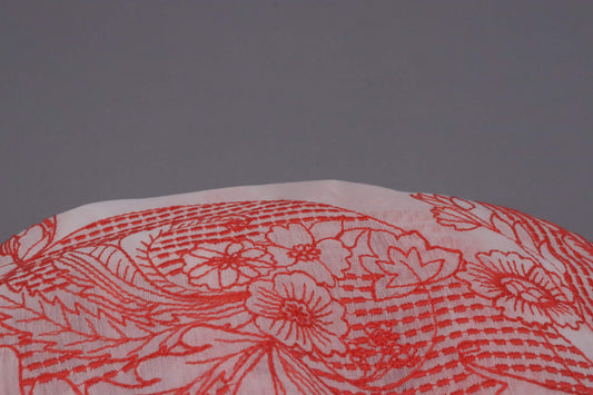 Tissu polyester blanc broderie cachemire rouge | Chant Rouge