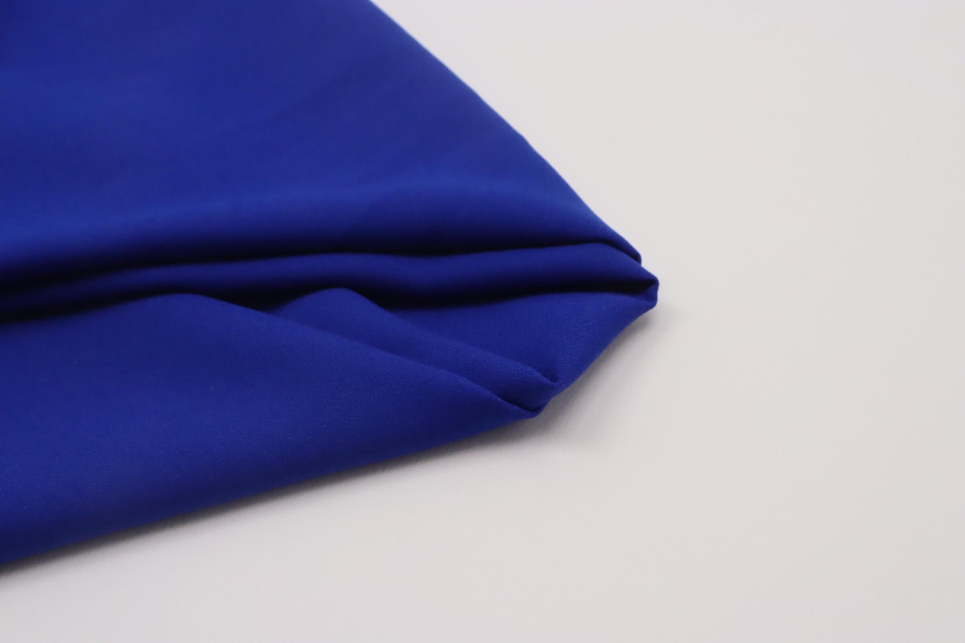 Tissu polyester envers satin bleu roi
