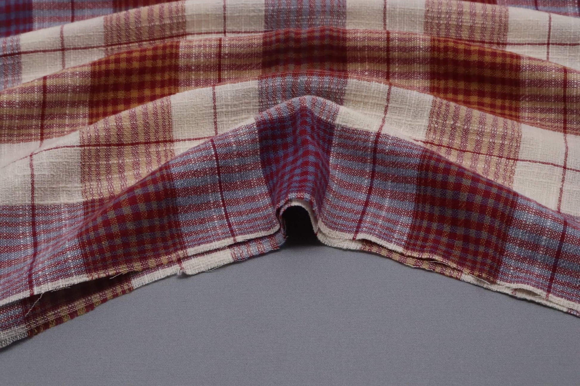 Tissu coton tramé motif tartan mauve et orange