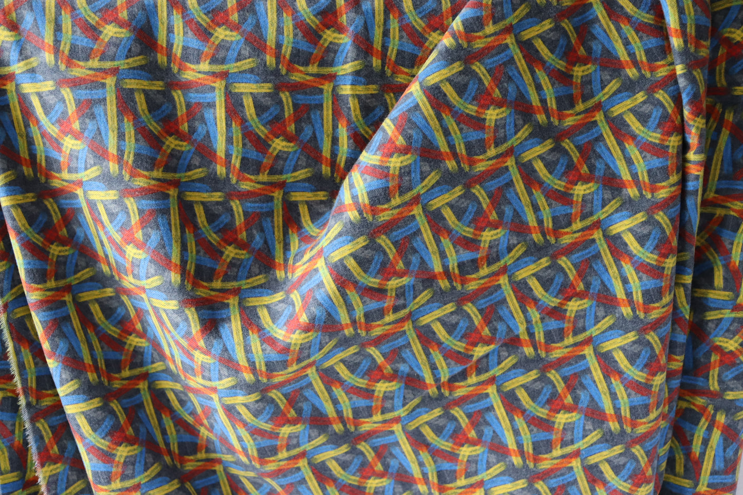 Tissu Coton imprimé graphique rouge bleu jaune