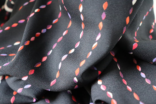 Tissu crêpe de viscose imprimé  noir et rouge