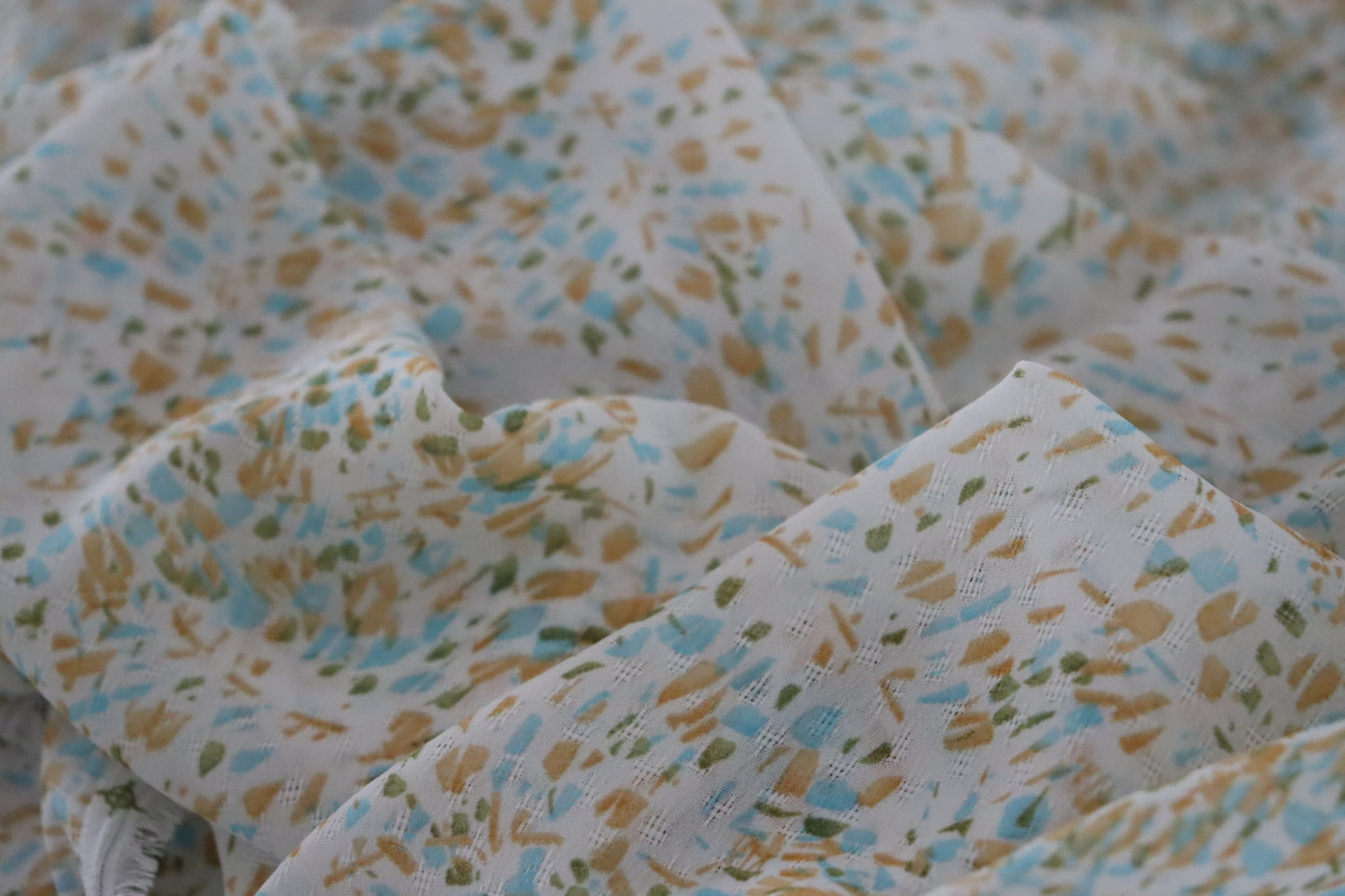 tissu crêpe polyester à motifs